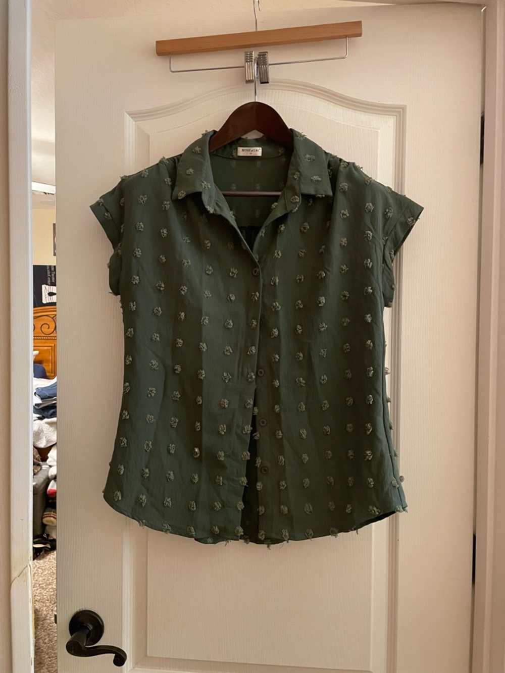 Sleeveless Olive Green Button-Up Blouse with Textured Dot Detail